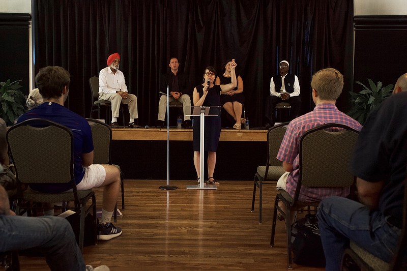 Staff photo by Wyatt Massey / Jaclyn Michael, assistant professor of religion and philosophy at the University of Tennessee at Chattanooga, introduces the Islamophobia panel at the Bessie Smith Cultural Center on Sept 17.