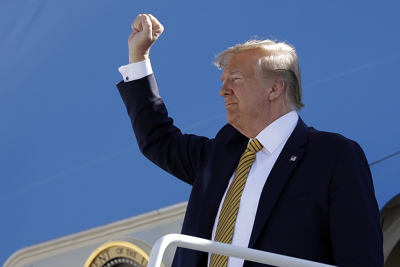 President Donald Trump boards Air Force One at Albuquerque International Sunport, Tuesday, Sept. 17, 2019, in Albuquerque, N.M. (AP Photo/Evan Vucci)
