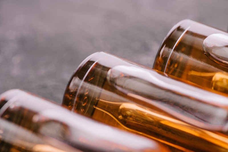 close up of bottles with cbd oil on grey background bottle tile / Getty Images
