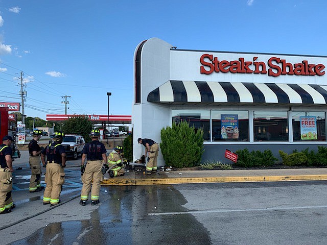Chattanooga firefighters on Monday snuffed out a small fire outside the Steak 'N Shake in the 5100 block of Hixson Pike. / Photos from Capt. Chris LaFerry/Chattanooga Fire Department