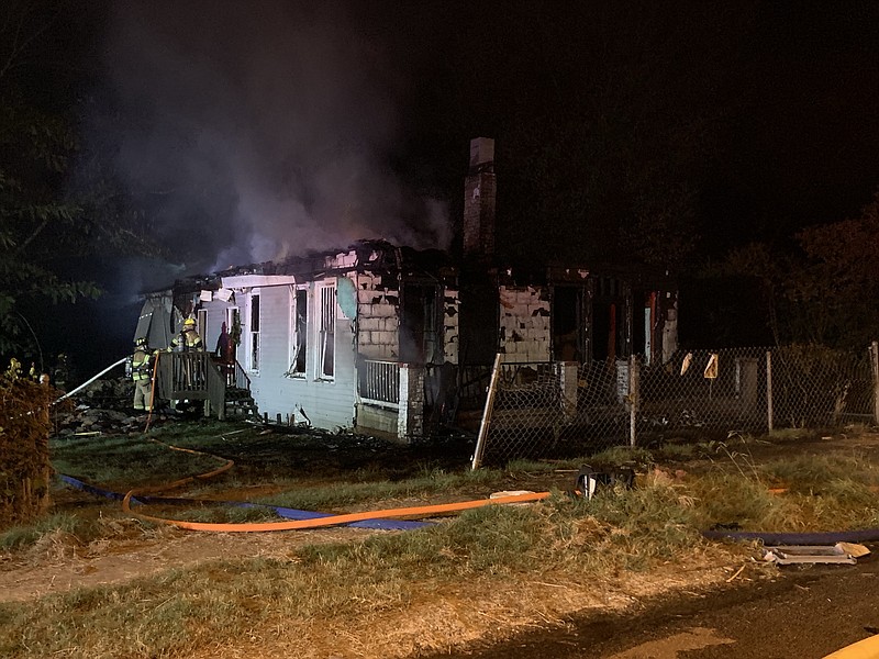 Chattanooga firefighters attempt to extinguish a house fire late Tuesday night, Sept. 17, 2019, in the 4100 block of Dorris Street on Chattanooga's Southside. / Photos from the Chattanooga Fire Department