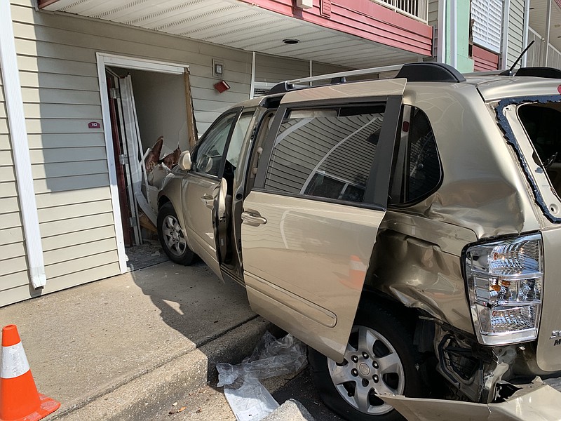A van crashed into an InTown Suite extended-stay hotel Wednesday afternoon on Lee Highway. Photo provided by the Chattanooga Fire Department. 