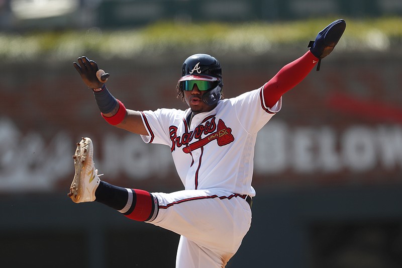 Associated Press photo by John Bazemore / Atlanta Braves center fielder Ronald Acuna Jr. gestures after reaching second base during the fifth inning of Thursday afternoon's home game against the Philadelphia Phillies.