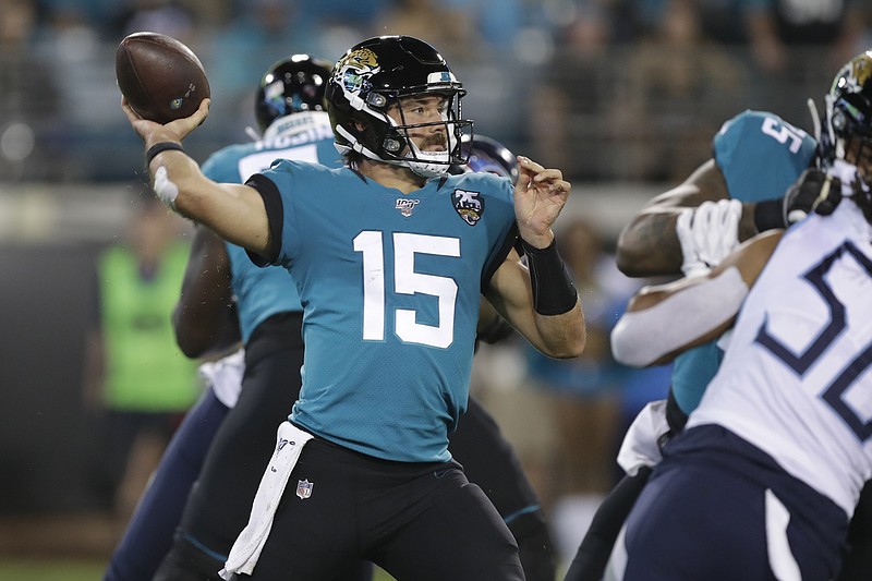 Associated Press photo by Chris O'Meara / Jacksonville Jaguars quarterback Gardner Minshew II passes during the first half of his team's 20-7 home win against the Tennessee Titans on Thursday night.