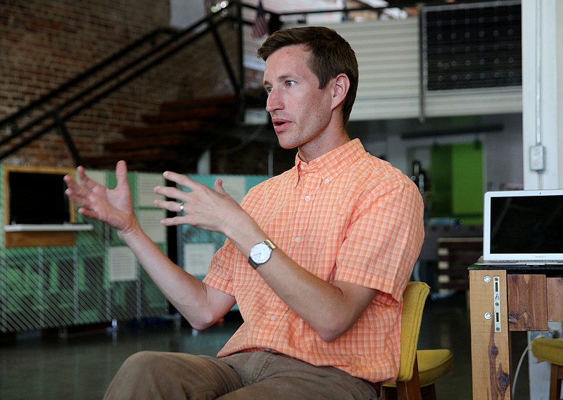 Michael Walton, Green Spaces executive director, talks about Green Spaces Empower Chattanooga program Tuesday, Oct. 3, 2017, at Green Spaces in downtown Chattanooga, Tenn.