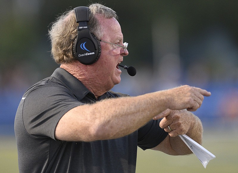 Staff photo by Robin Rudd / Ringgold football coach Robert Akins signals to his offense during a home game against Lakeview-Fort Oglethorpe on Sept. 20, 2019.