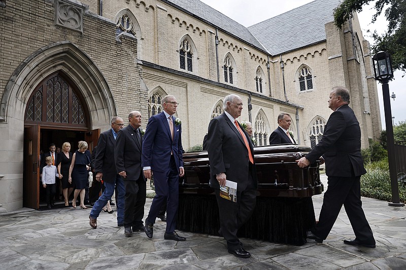 Pallbearers walk the casket bearing T. Boone Pickens from the Highland Park United Methodist Church following his funeral service in Dallas, Thursday, Sept. 19, 2019. (Tom Fox/The Dallas Morning News via AP, Pool)