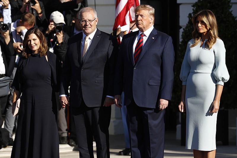President Donald Trump and first lady Melania Trump welcome Australian Prime Minister Scott Morrison and his wife Jenny Morrison during a State Arrival Ceremony on the South Lawn of the White House in Washington, Friday, Sept. 20, 2019, in Washington. (AP Photo/Patrick Semansky)