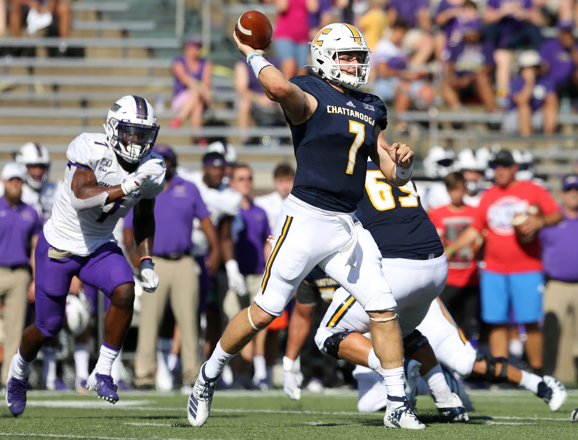 Staff photo by Erin O. Smith / UTC quarterback Nick Tiano (7) throws the ball during the UTC vs. James Madison University NCAA football game Saturday, August 21, 2019 at Finley Stadium in Chattanooga, Tennessee. JMU was up 20-14 at the half.