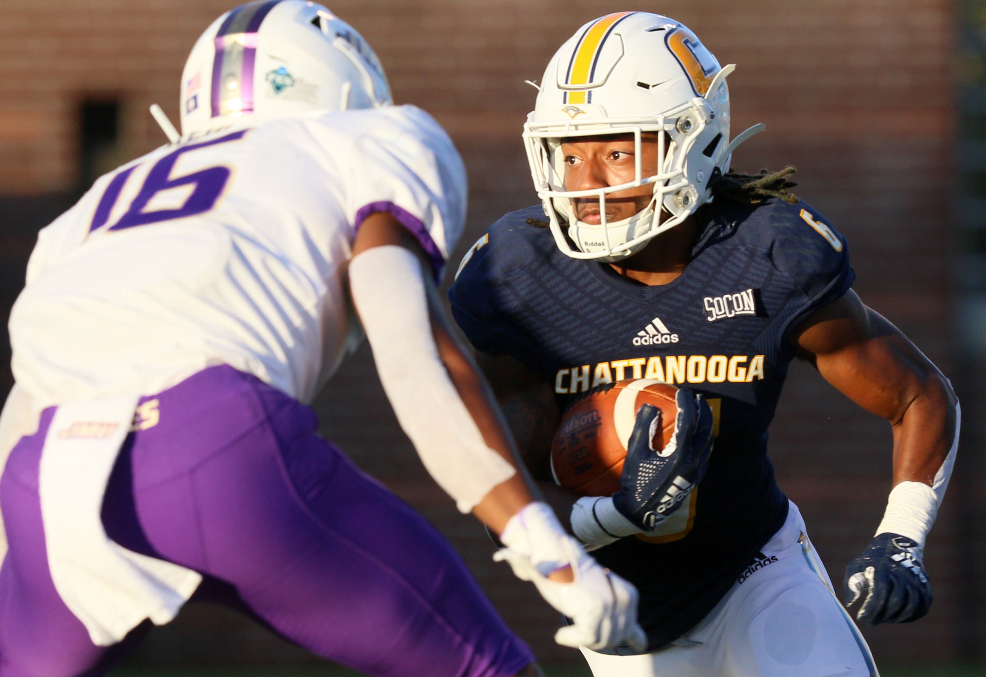 Staff photo by Erin O. Smith / UTC's Jeffrey Wood II (6) runs the ball during the UTC vs. James Madison University NCAA football game Saturday, August 21, 2019 at Finley Stadium in Chattanooga, Tennessee. JMU beat UTC with a score of 37-14.