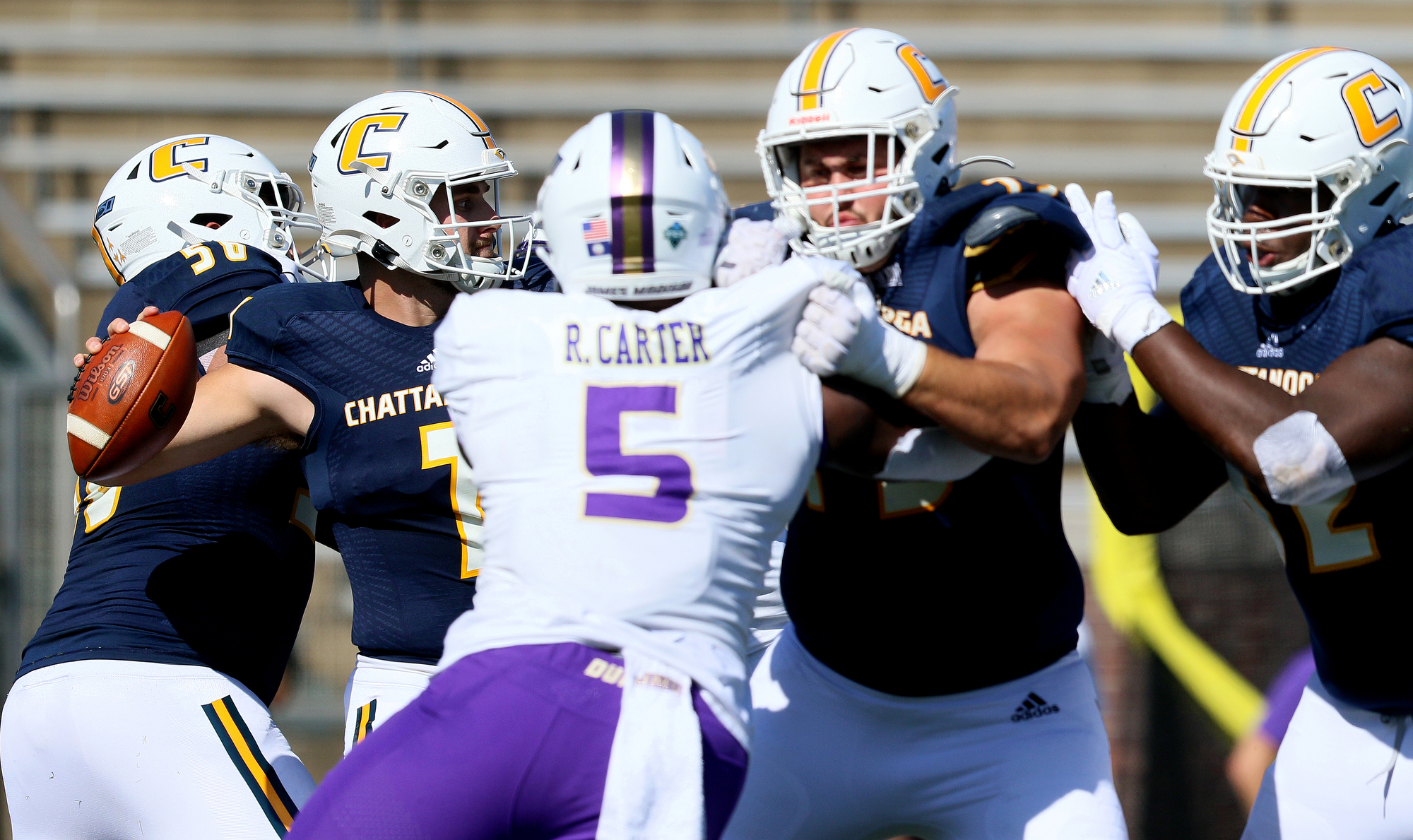 Staff photo by Erin O. Smith / UTC quarterback Nick Tiano (7) throws a pass during the UTC vs. James Madison University NCAA football game Saturday, August 21, 2019 at Finley Stadium in Chattanooga, Tennessee. JMU beat UTC with a score of 37-14.