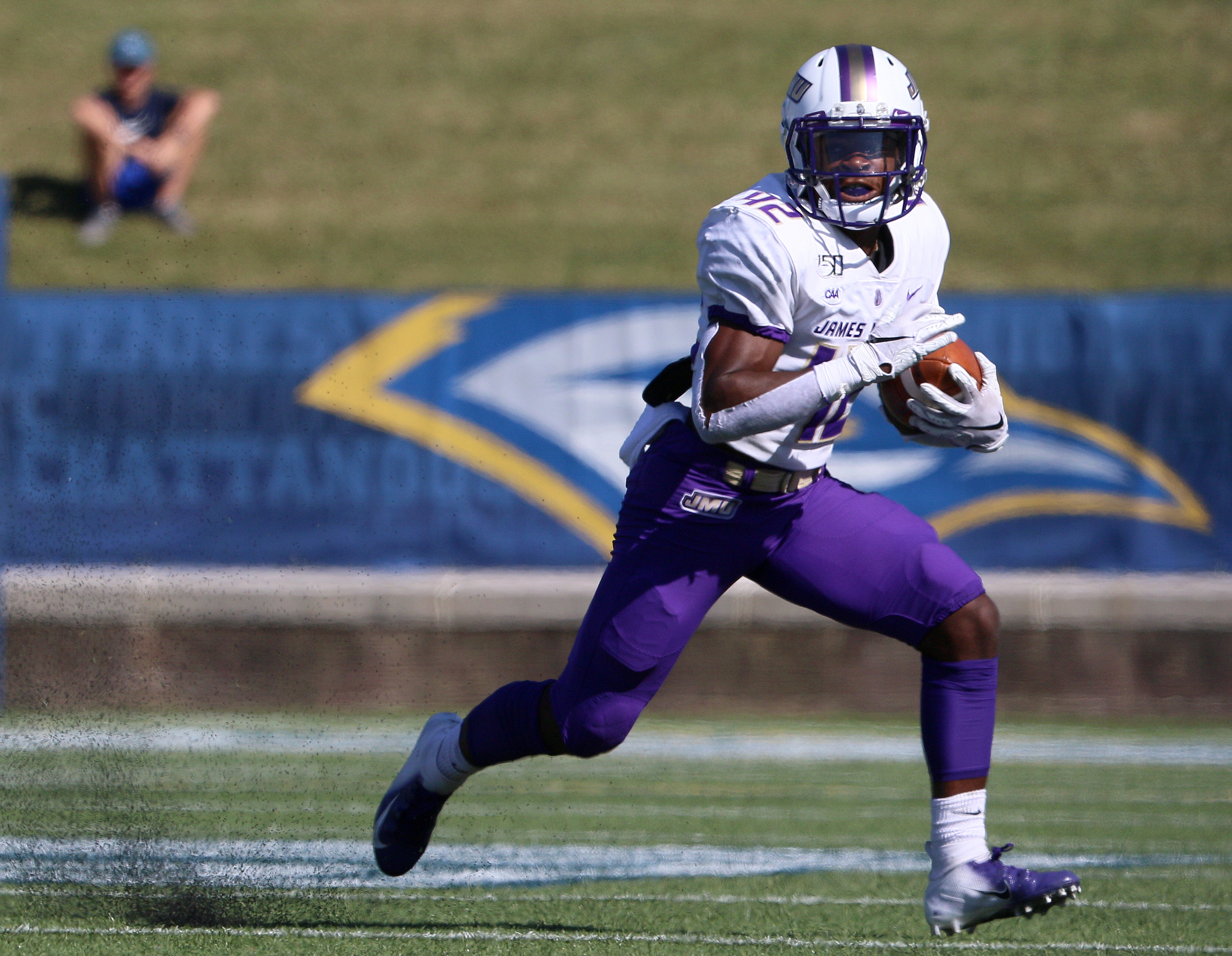 Staff photo by Erin O. Smith / James Madison University's Solomon Vanhorse (42) runs the ball during the UTC vs. James Madison University NCAA football game Saturday, August 21, 2019 at Finley Stadium in Chattanooga, Tennessee. JMU beat UTC with a score of 37-14.