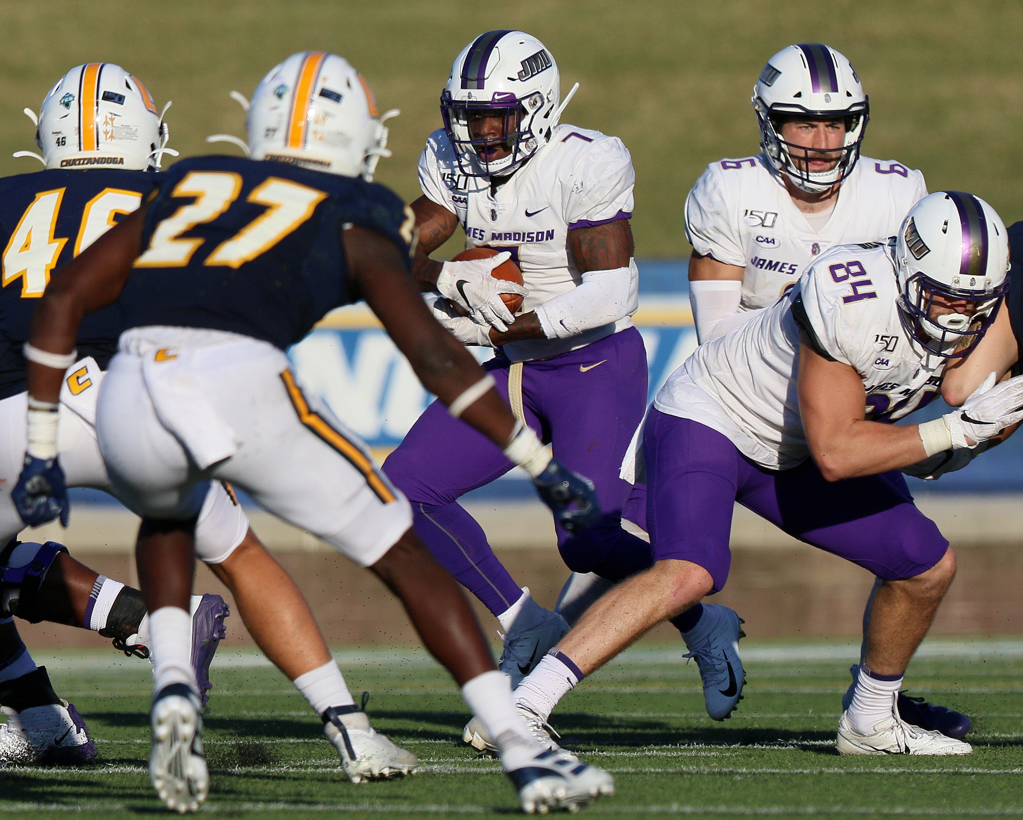 Staff photo by Erin O. Smith / James Madison University's Jawon Hamilton (7) runs the ball during the UTC vs. James Madison University NCAA football game Saturday, August 21, 2019 at Finley Stadium in Chattanooga, Tennessee. JMU beat UTC with a score of 37-14.