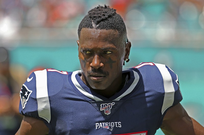 Associated Press photo by David Santiago / Wide receiver Antonio Brown waits for the start of the New England Patriots' game against the Miami Dolphins on Sept. 15 in Miami Gardens, Fla. Brown was released by the Patriots on Friday after a second woman accused him of sexual misconduct.