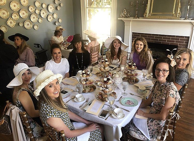 Photo from Rashelle Stafford / Guests prepare for the Downton Abbey tea at Polly Claire's Tea Room.