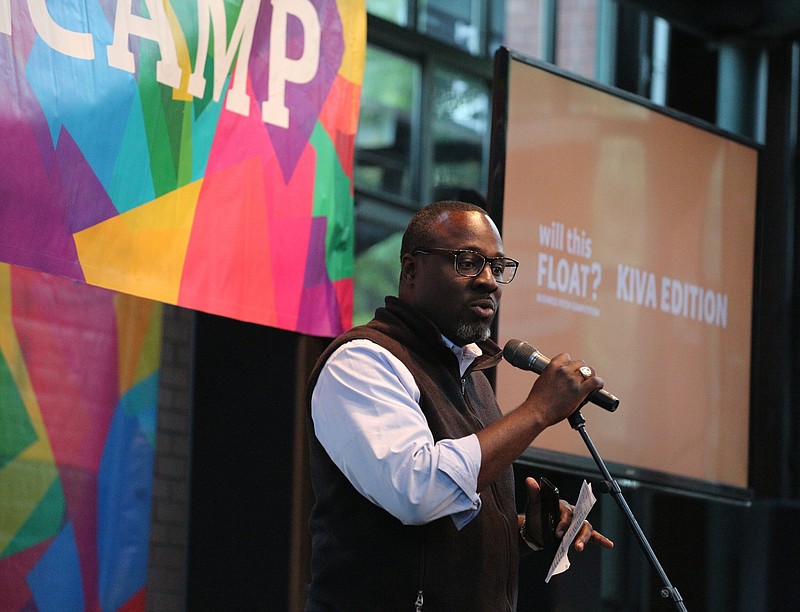 Marcus Shaw, Co.Lab executive director, opens up the "Will This Float" event at Miller Plaza in October 2018.