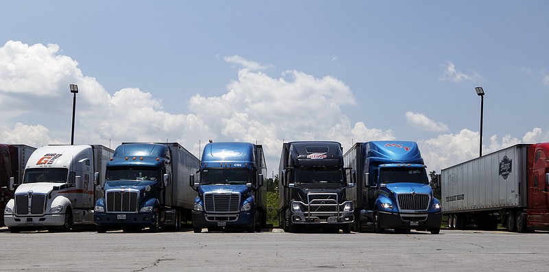 Tractor-trailers are seen parked in the back of a Pilot Travel Center near Chattanooga.