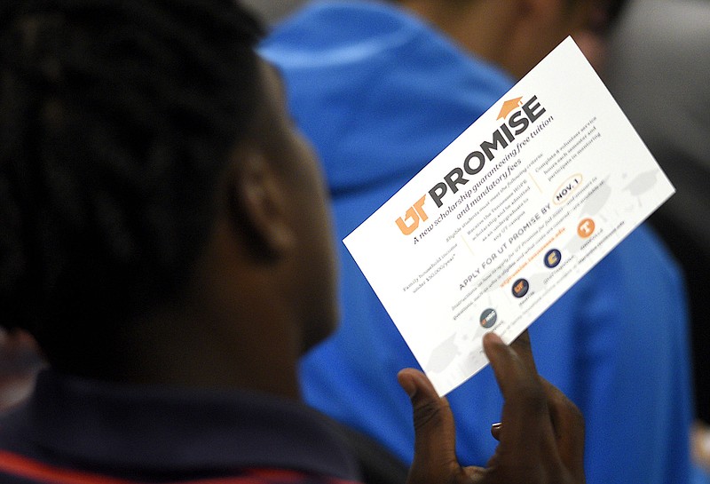 Staff Photo by Robin Rudd/  A Red Bank student looks at information concerning UT Promise.  Interim UT President Randy Boyd and UTC Chancellor Steve Angle were at Red Bank High School to discuss the UT Promise Endowment campaign with the school's juniors and seniors.  