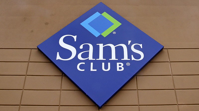 File-This Feb. 23, 2018, file photo shows the company logo of Sam's Club on the facade of a store in Concord, N.H.. Walmart’s Sam’s Club is teaming up with several health care companies to offer discounts on everyday care its customers might delay or skip because of the cost. Starting early October, Sam’s Club members in Michigan, Pennsylvania and North Carolina, will be able to buy one of four bundles of health care services ranging in annual fees from $50 for individuals to $240 for a family of up to six members. The pilot program could potentially be rolled out to members in all the states, says Lori Flees, senior vice president of Sam’s Club Health and Wellness. (AP Photo/Charles Krupa, File)