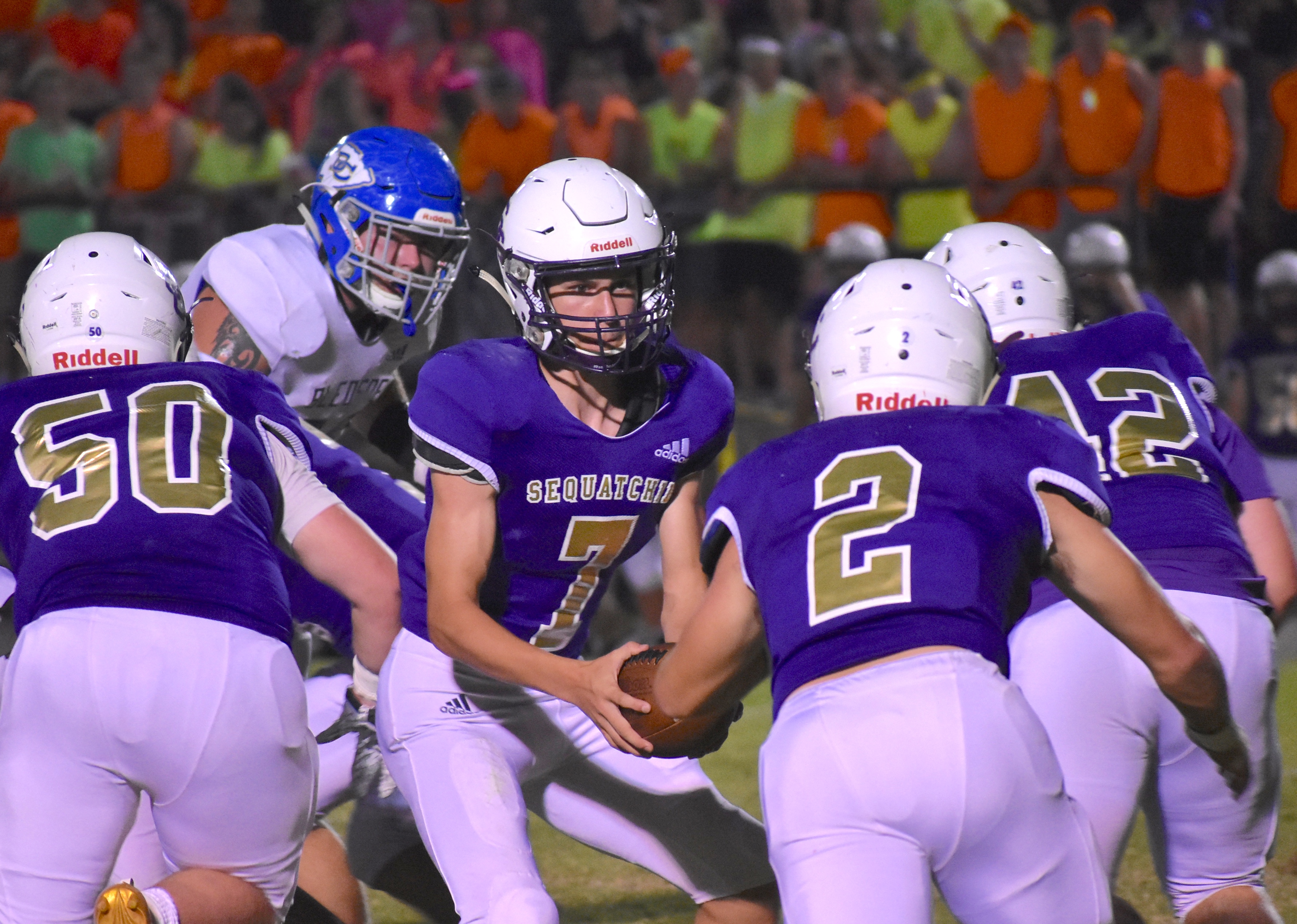 Staff photo by Patrick MacCoon / Sequatchie County quarterback Austin McCurry looks to hand off to Walt Jones during a 21-14 home win over Bledsoe County on Friday night.