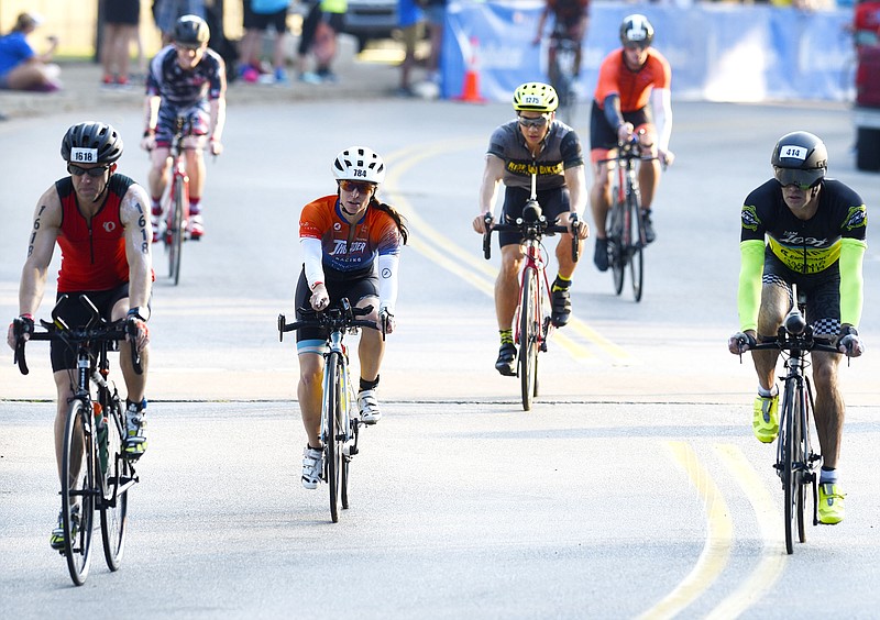 Staff Photo by Robin Rudd/  Athletes start down Riverfront Parkway on the beginning of the bicycle segment.  The Little Debbie Ironman Chattanooga took place under hot conditions on September 29, 2019.  