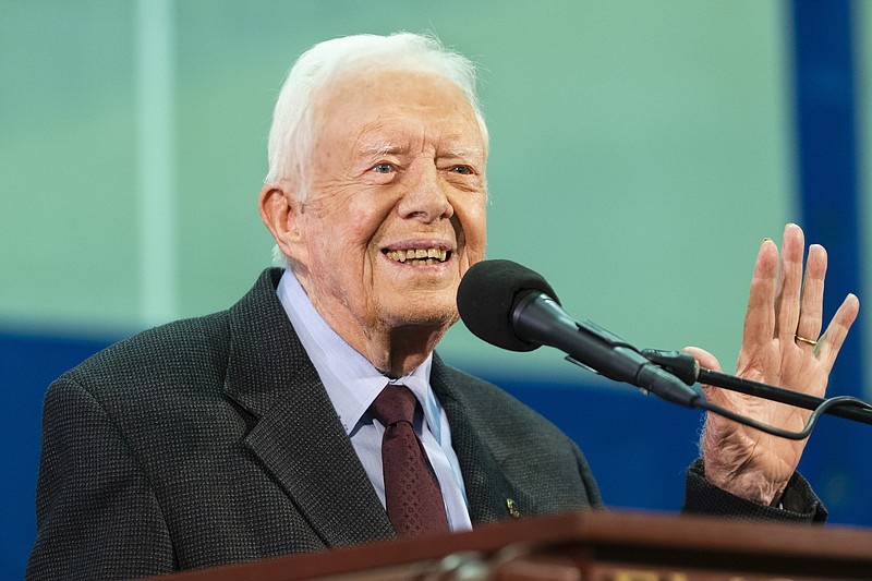 In this Sept. 18, 2019, file photo former President Jimmy Carter acknowledges a student who's question has been picked for him to answer during an annual Carter Town Hall held at Emory University in Atlanta. Carter turns 95 on Tuesday, Oct. 1. (AP Photo/John Amis, File)