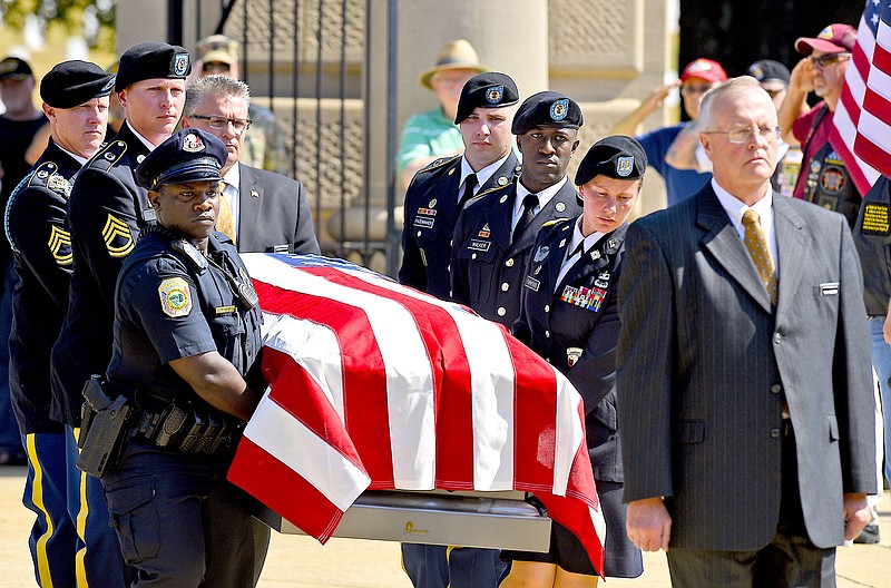 Staff Photo by Robin Rudd/  U.S. Army Pallbearers carry the casket bearing Richard "Lance" Deal into position for the service.  The funeral service for Richard "Lance" Deal was held at the Chattanooga National Cemetery on October 2, 2019.  Several organizations came together to honor Deal who had no family.  
