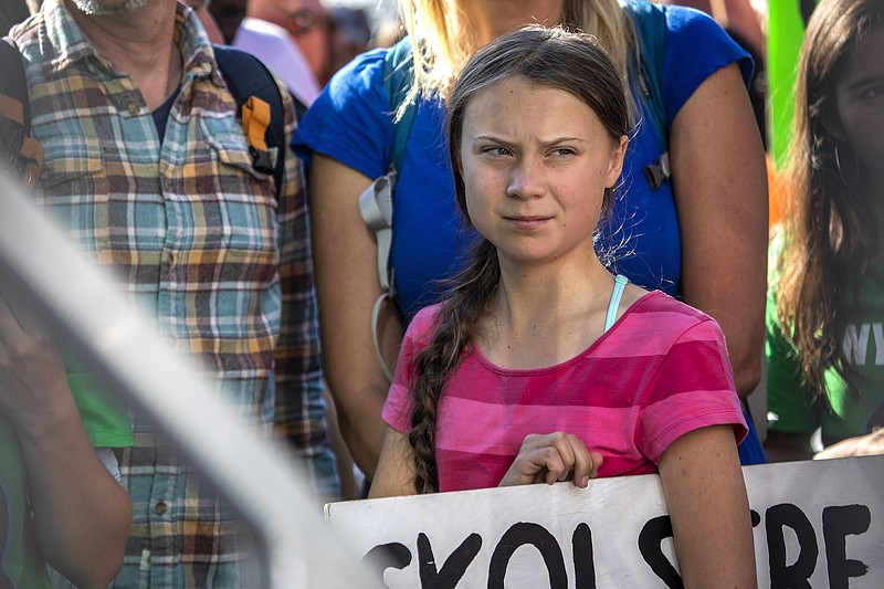 Photo by Brittainy Newman of The New York Times / Greta Thunberg, the 16-year-old Swedish environmental activist, at a protest of climate change inaction where she spoke to the crowd, in Manhattan, on Sept. 20.