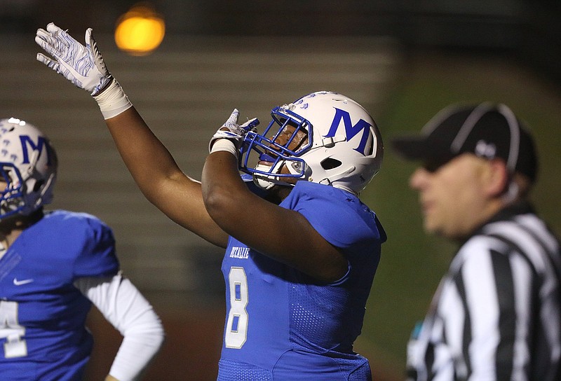 Staff photo by Erin O. Smith / McCallie's Jay Hardy (8) celebrates a turnover during a playoff game last November against Ensworth. Hardy is out with a knee injury inflicted intentionally by a West Forsyth player last week.