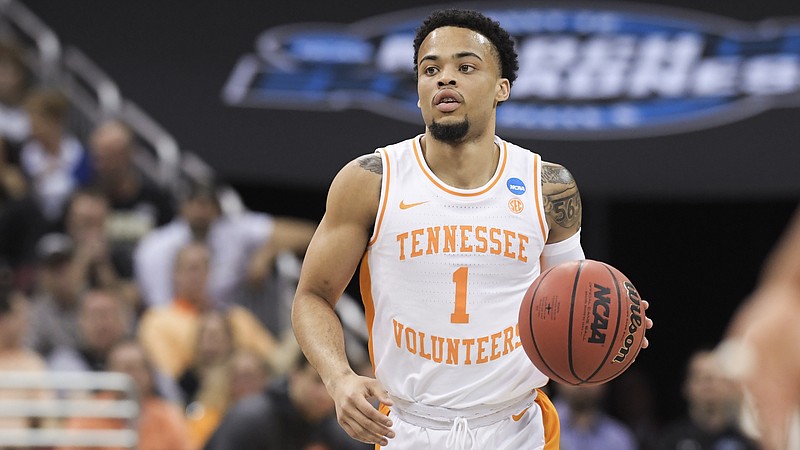AP photo by Timothy D. Easley / Tennessee guard Lamonte Turner dribbles downcourt against Purdue during an NCAA tournament South Regiona semifinal on March 28, 2019, in Louisville, Ky.
