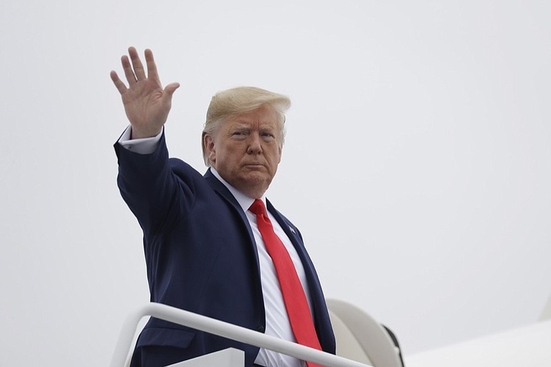 President Donald Trump boards Air Force One for a trip to Florida for an event on healthcare, Thursday, Oct. 3, 2019, in Andrews Air Force Base, Md. (AP Photo/Evan Vucci)


