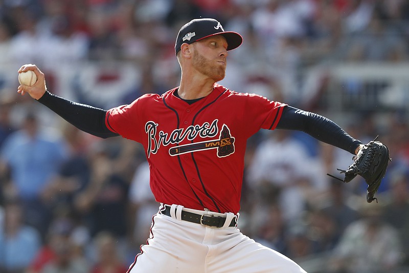 AP photo by John Bazemore / Atlanta starter Mike Foltynewicz pitches during the first inning of Game 2 of the Braves' NL Division Series against the St. Louis Cardinals on Friday in Atlanta.