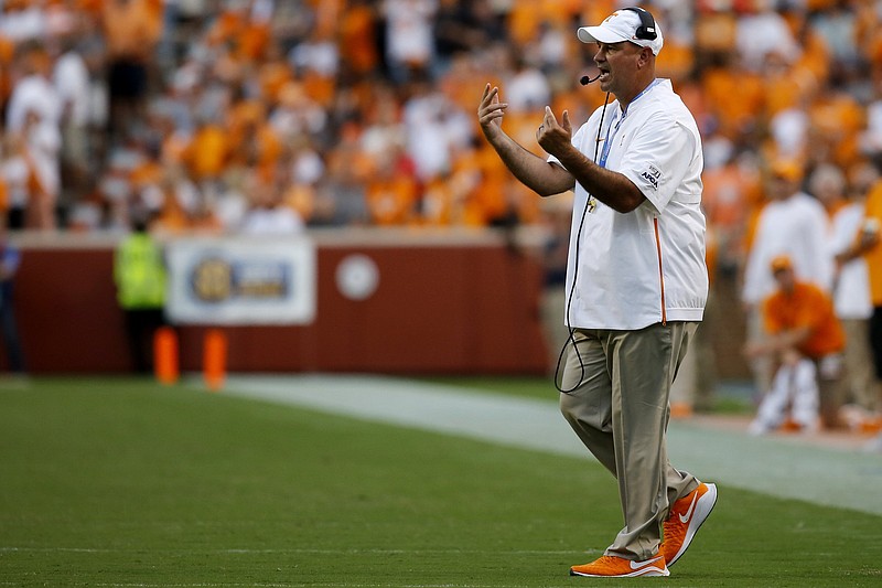 Staff photo by C.B. Schmelter / Tennessee football coach Jeremy Pruitt signals to his players during the Vols' double-overtime loss to BYU on Sept. 7 in Knoxville.