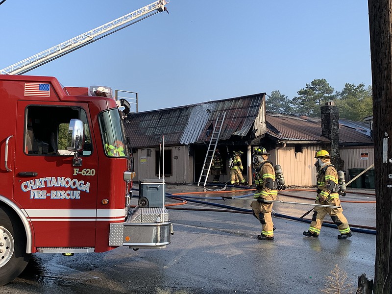 Photo by Lyndsey Rogers/Chattanooga Fire Department. Firefighters work the scene of a fire on the 6000 block of Bonny Oaks Drive on Saturday afternoon.