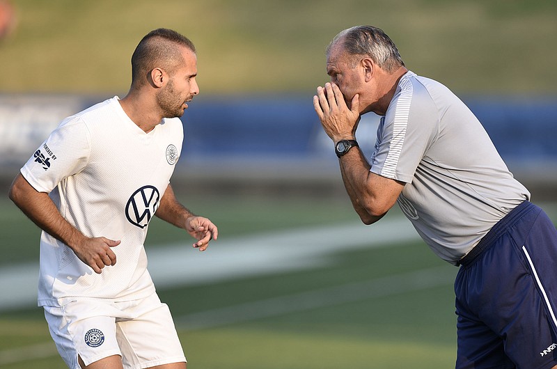 Staff photo by Robin Rudd / Chattanooga FC coach Peter Fuller gives instructions to Joao Costa during Saturday's game.