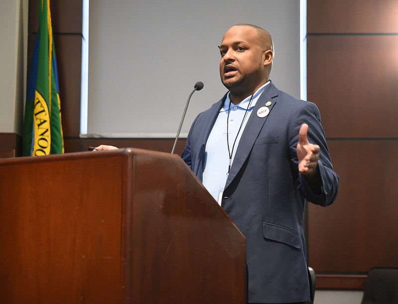 Staff photo by Tim Barber/ Jermain Freeman, with the city's Department of Economic and Community Development, speaks to the Industrial Development Board Monday about the usage of the former Harriett Tubman 29-acres in East Chattanooga.