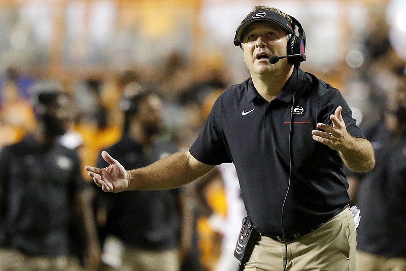 Staff photo by C.B. Schmelter / Georgia football coach Kirby Smart reacts to a call during Saturday night's 43-14 victory over Tennessee inside Neyland Stadium.