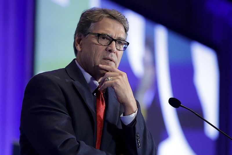 In this Sept. 6, 2019, file photo, Energy Secretary Rick Perry speaks at the California GOP fall convention in Indian Wells, Calif. Perry pushed Ukraine's president earlier in 2019 to replace members of a key supervisory board at Naftogaz, a massive state-owned petroleum company. (AP Photo/Chris Carlson, File)