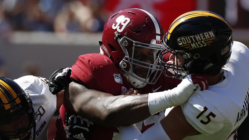 Alabama photo by Kent Gidley / Raekwon Davis and the Alabama defense had success against Southern Mississippi quarterback Jack Abraham on Sept. 21, but they struggled a week later against Ole Miss dual-threat freshman John Rhys Plumlee.