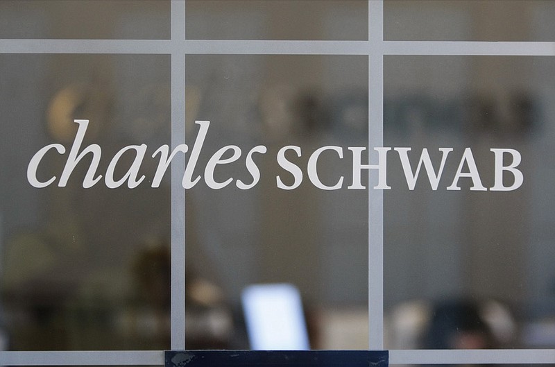 FILE - This July 14, 2010, file photo, shows a Charles Schwab office in Oakland, Calif. AP Photo/Paul Sakuma, File)


