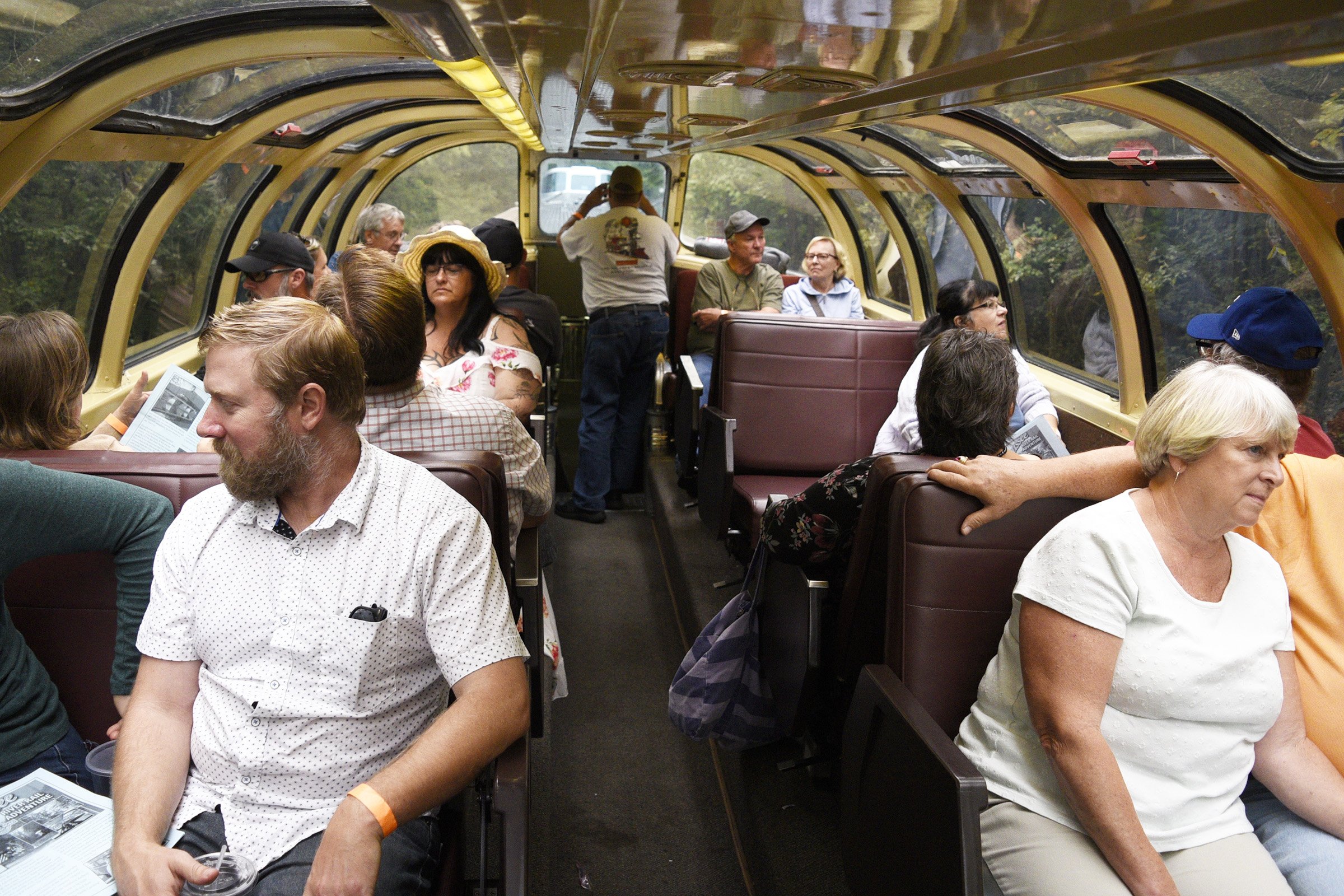 Staff Photo by Robin Rudd/ Passengers enjoy the views from one of two dome cars.