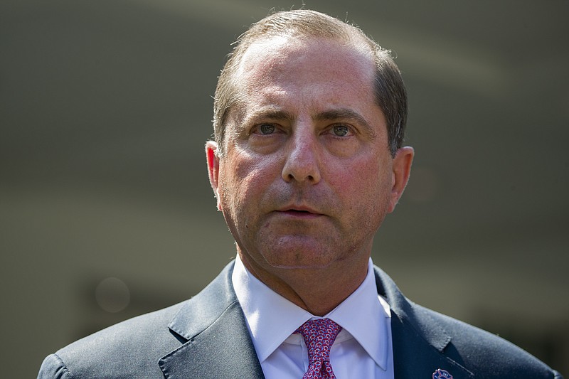 FILE - In this Sept. 11, 2019, file photo, Health and Human Services Secretary Alex Azar speaks with reporters outside of the White House in Washington. The Trump administration Wednesday, Oct. 9, proposed to overhaul decades-old Medicare rules originally meant to deter fraud and abuse, but now seen as a roadblock to coordinating better care for patients. The rules under revision were intended to counter self-dealing, as well as financial kickbacks among service providers such as hospitals, clinics and doctors. (AP Photo/Alex Brandon, File)