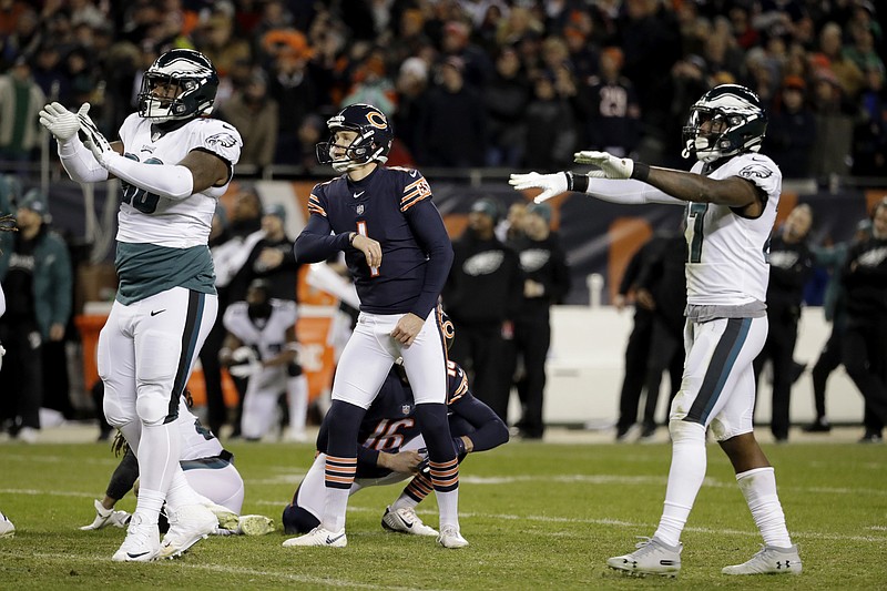 AP photo by Nam Y. Huh / Chicago Bears kicker Cody Parkey, center, watches as the football bounces off the left upright and crossbar after he attempted a 43-yard field goal in the final seconds of a wild-card playoff game against the Philadelphia Eagles in January. The Bears released Parkey in March, but he signed Tuesday with the Tennessee Titans.