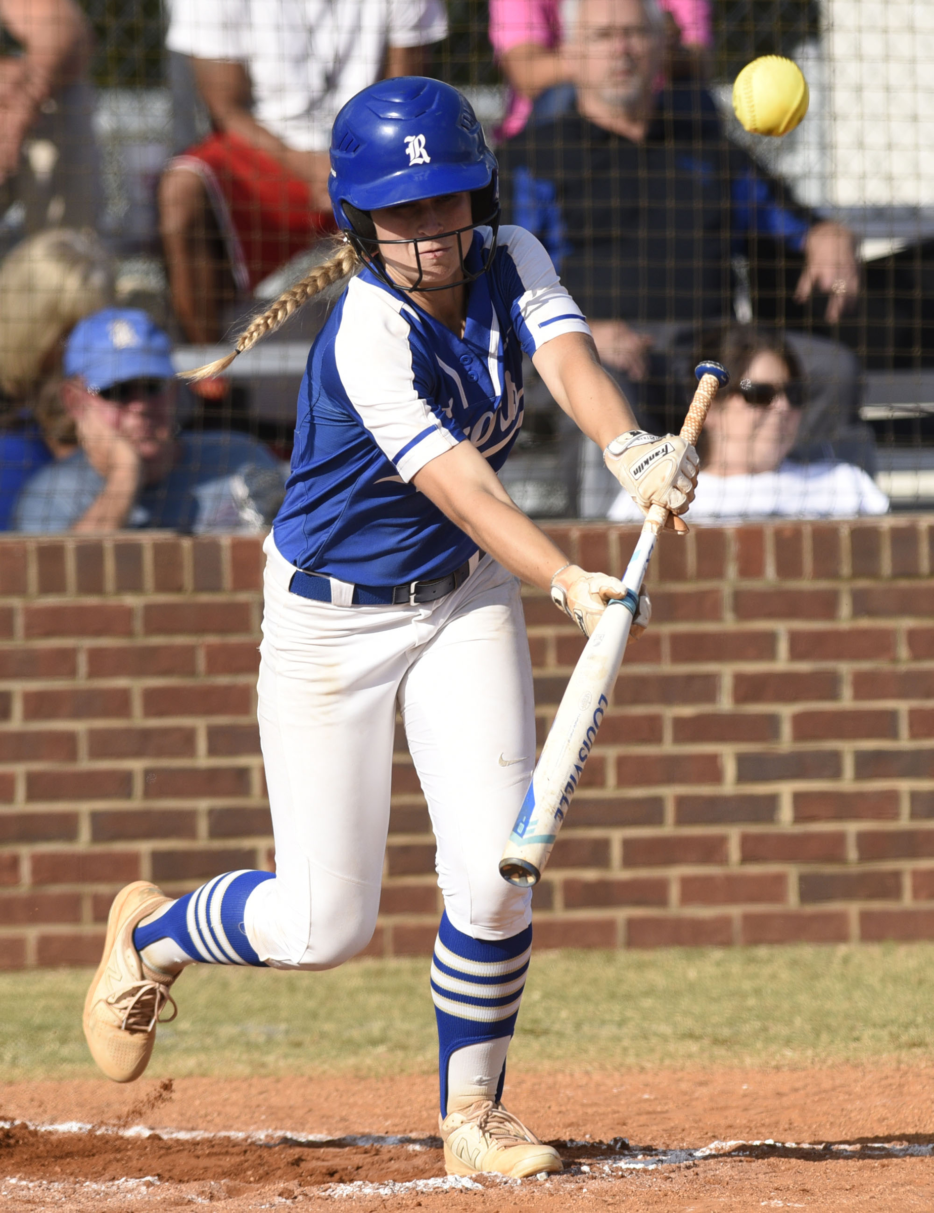 Ringgold's Shelby Cole lays down a bunt for a single in Wednesday's GHSA Class AAA state playoff doubleheader against Morgan County. Host Ringgold won both games.