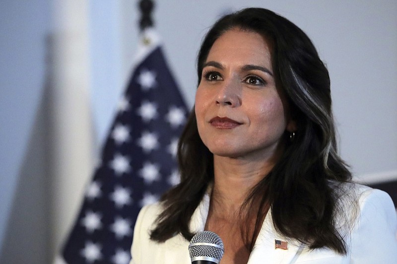 Democratic presidential candidate U.S. Rep. Tulsi Gabbard, D-Hawaii, listens to a question during a campaign stop in Londonderry, N.H., Tuesday, Oct. 1, 2019. (AP Photo/Charles Krupa)


