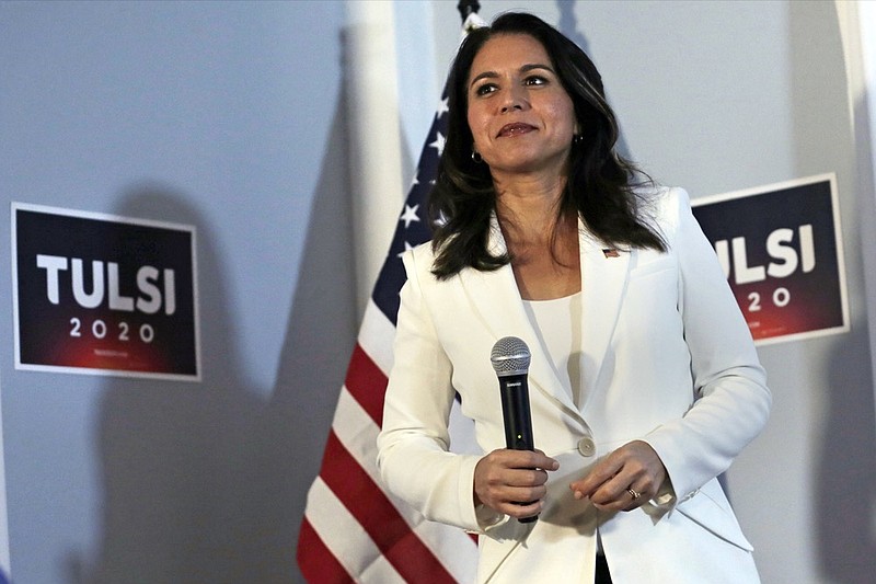 Democratic presidential candidate U.S. Rep. Tulsi Gabbard, D-Hawaii, listens to a question during a campaign stop in Londonderry, N.H., Tuesday, Oct. 1, 2019. (AP Photo/Charles Krupa)


