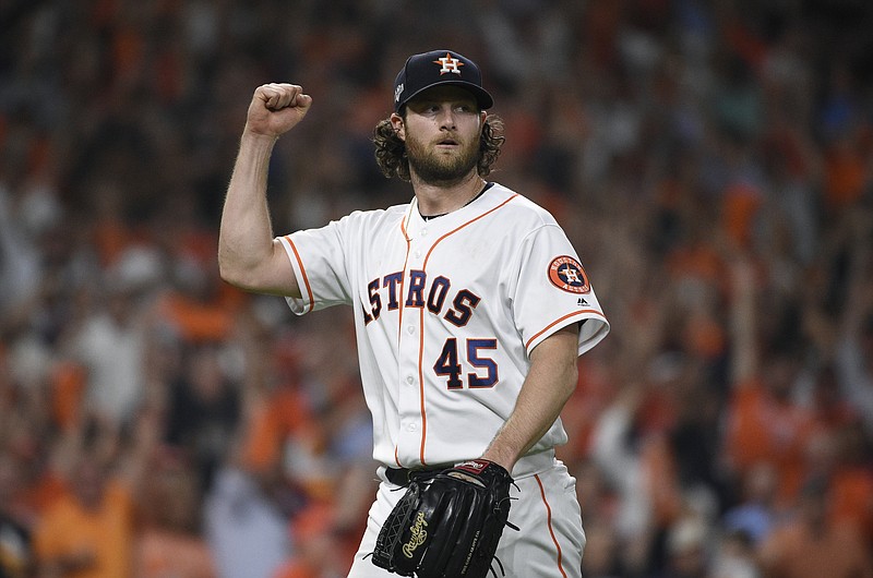 AP photo by Christian Smith / Houston Astros starting pitcher Gerrit Cole reacts after an out against the Tampa Bay Rays during the seventh inning of Game 5 of their AL Division Series on Thursday night.