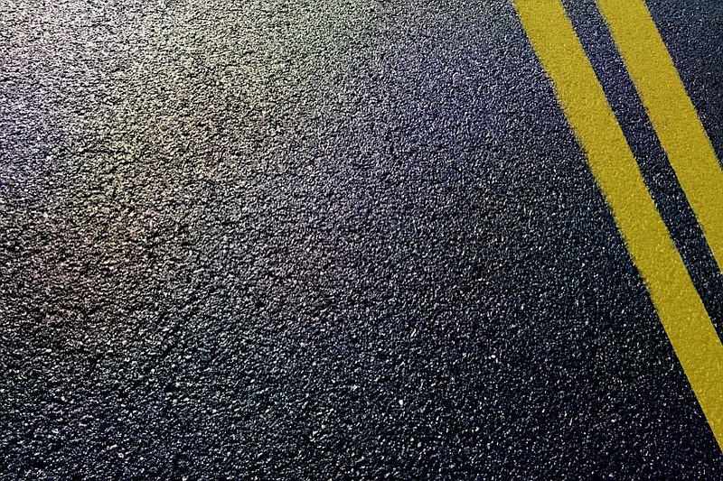 asphalt detail of road road tile road projects construction road work / Getty Images

