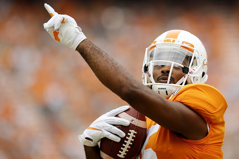 Staff photo by C.B. Schmelter / Tennessee wide receiver Jauan Jennings (15) celebrates his 12-yard touchdown catch against UTC on Sept. 14 in Knoxville.