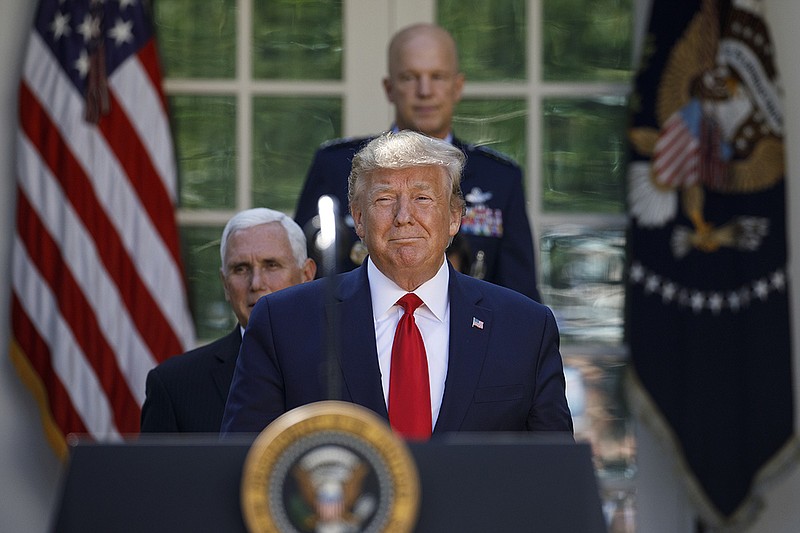 President Donald Trump arrives with Vice President Mike Pence, and Gen. John "Jay" Raymond, for a ceremony to establish the U.S. Space Command in the Rose Garden of the White House in Washington, Thursday, Aug. 29, 2019. (AP Photo/Carolyn Kaster)